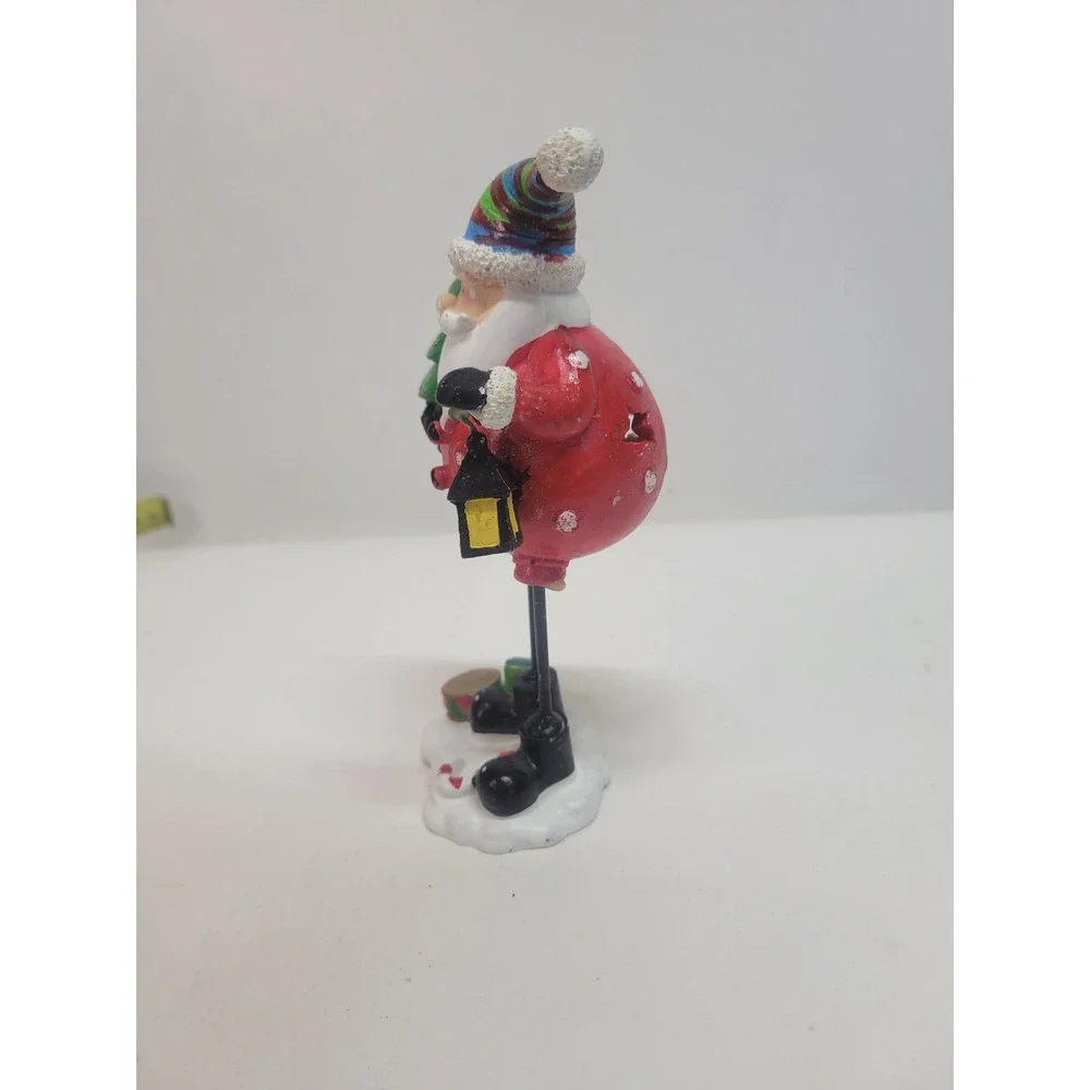 Charming Santa Claus Figurine with Lantern and Christmas‎ Tree Whimsical Decor